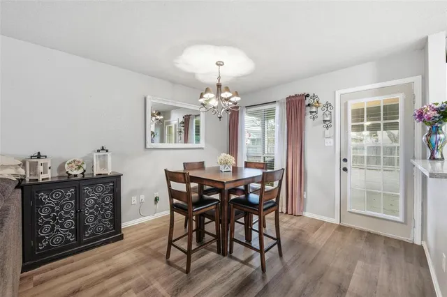 a kitchen with stainless steel appliances granite countertop a stove and a microwave
