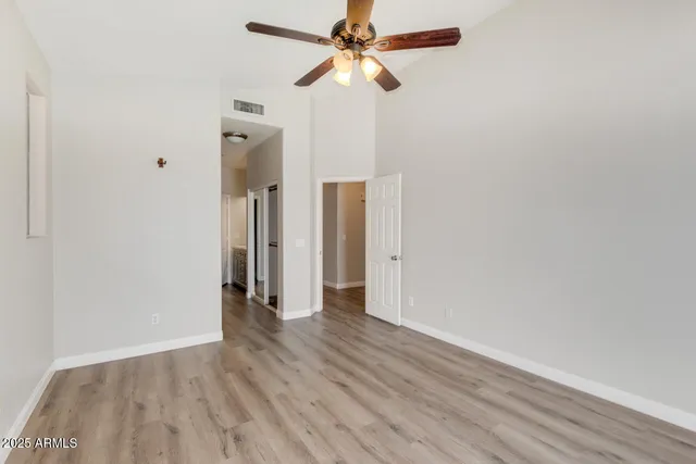 a view of a livingroom with wooden floor