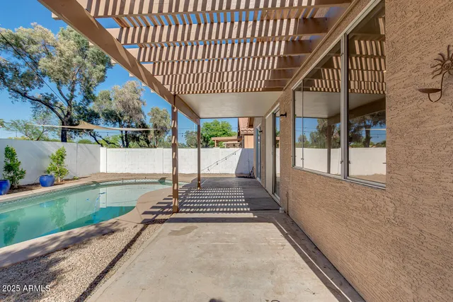 a view of a porch with a backyard