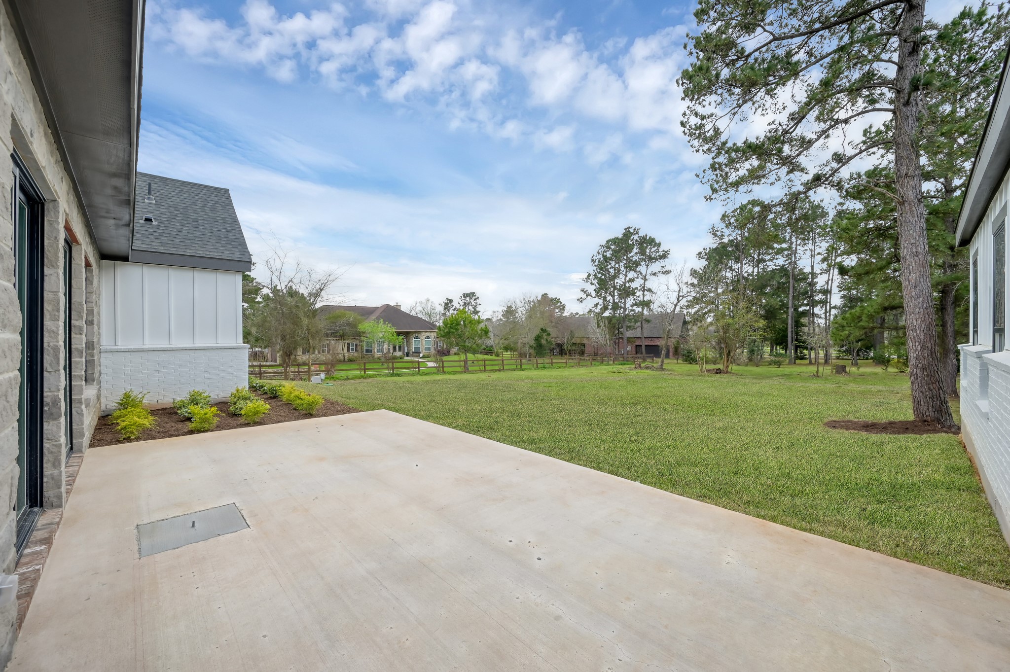 14742 Turquoise Trail Willis, TX 77378 - Photo 37 of 48 a view of a garden with an trees