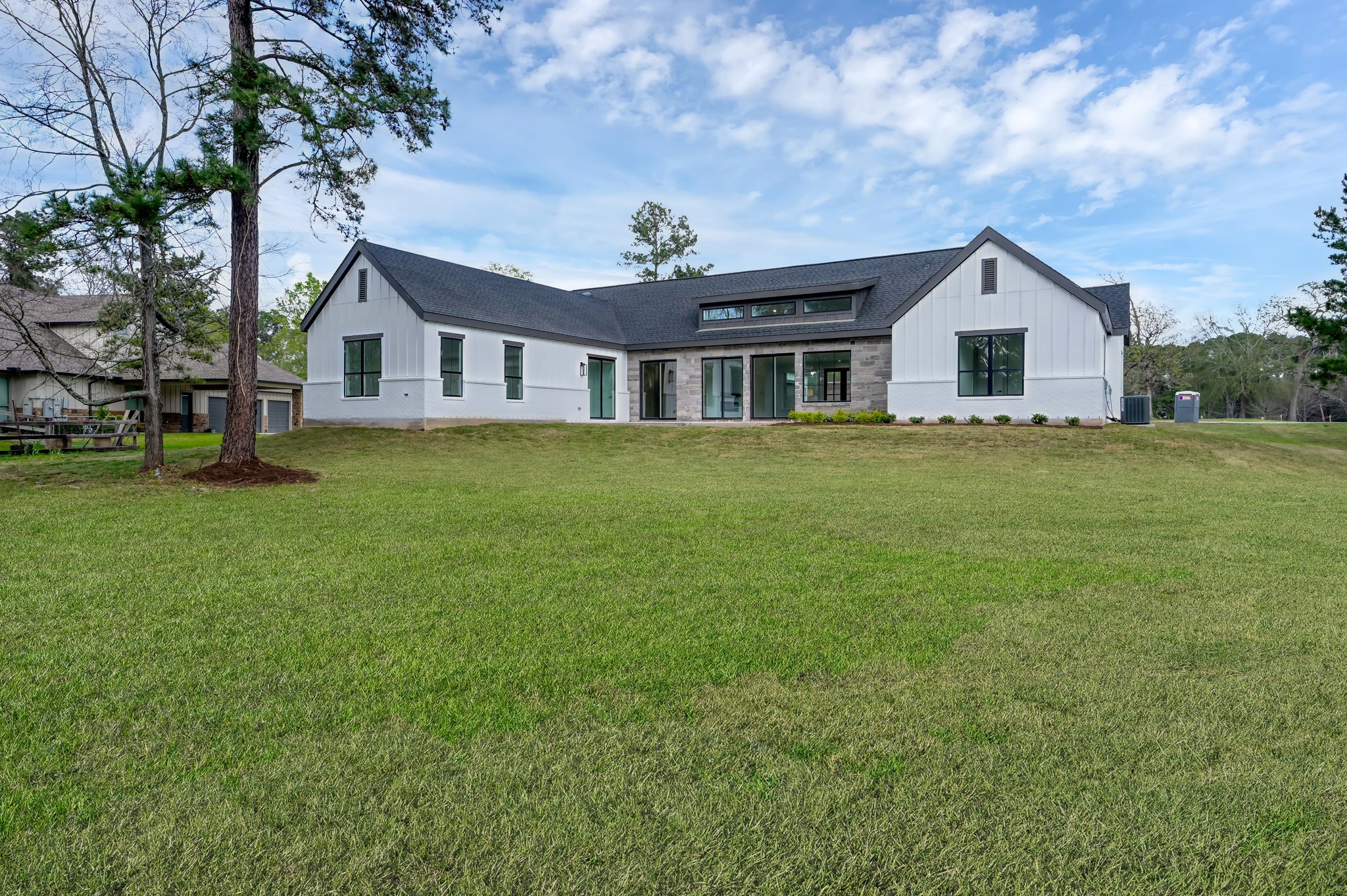 14742 Turquoise Trail Willis, TX 77378 - Photo 38 of 48 a house with garden in front of it