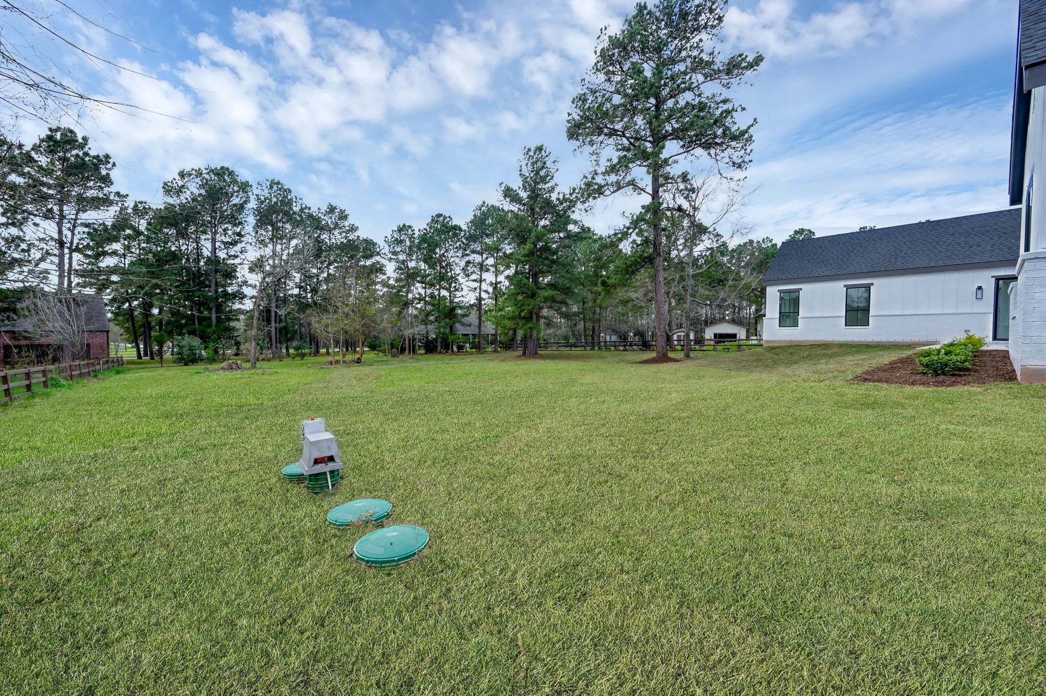 14742 Turquoise Trail Willis, TX 77378 - Photo 40 of 48 a backyard of a house with lots of green space