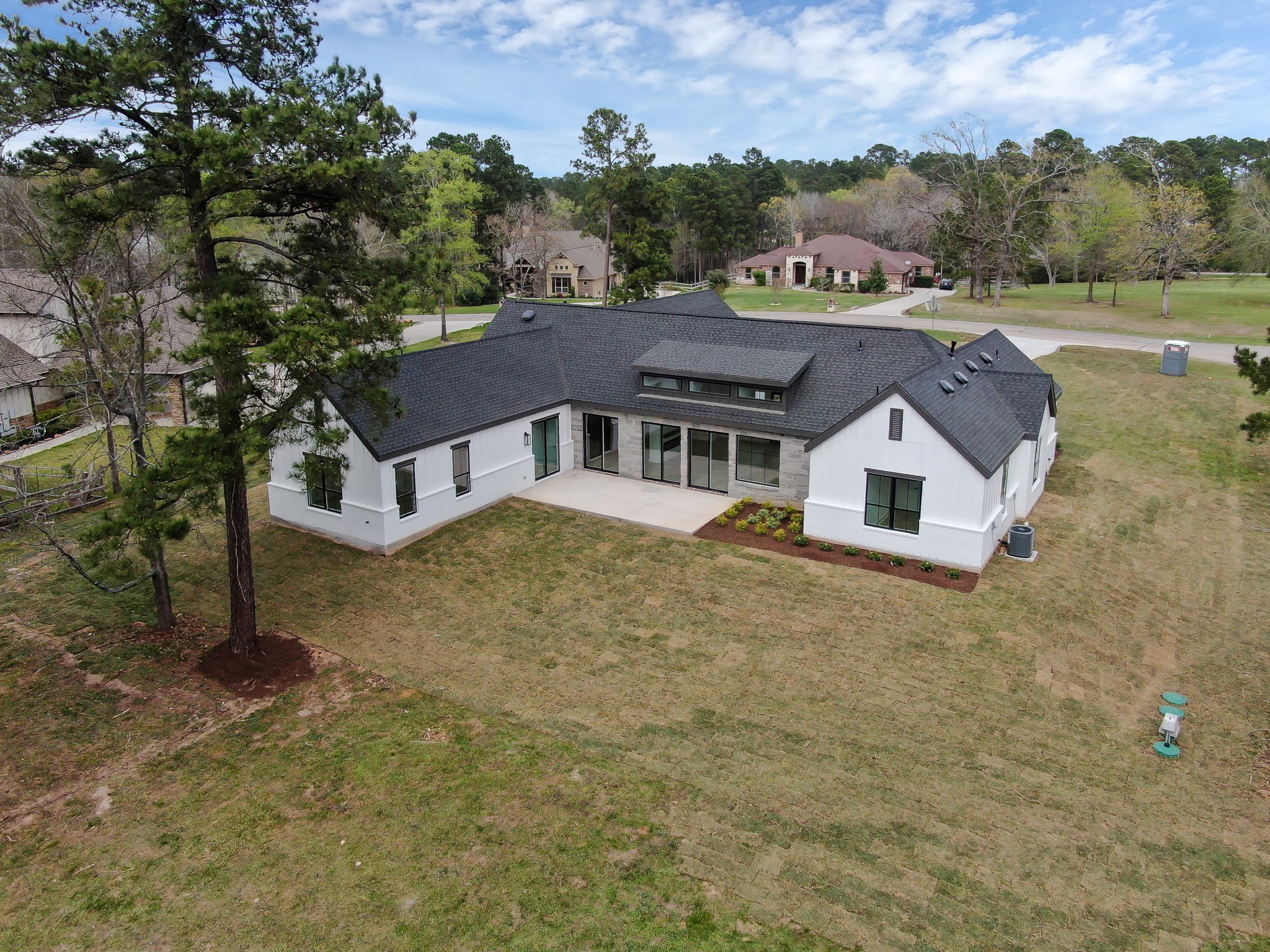 14742 Turquoise Trail Willis, TX 77378 - Photo 42 of 48 an aerial view of house with yard and mountain view in back