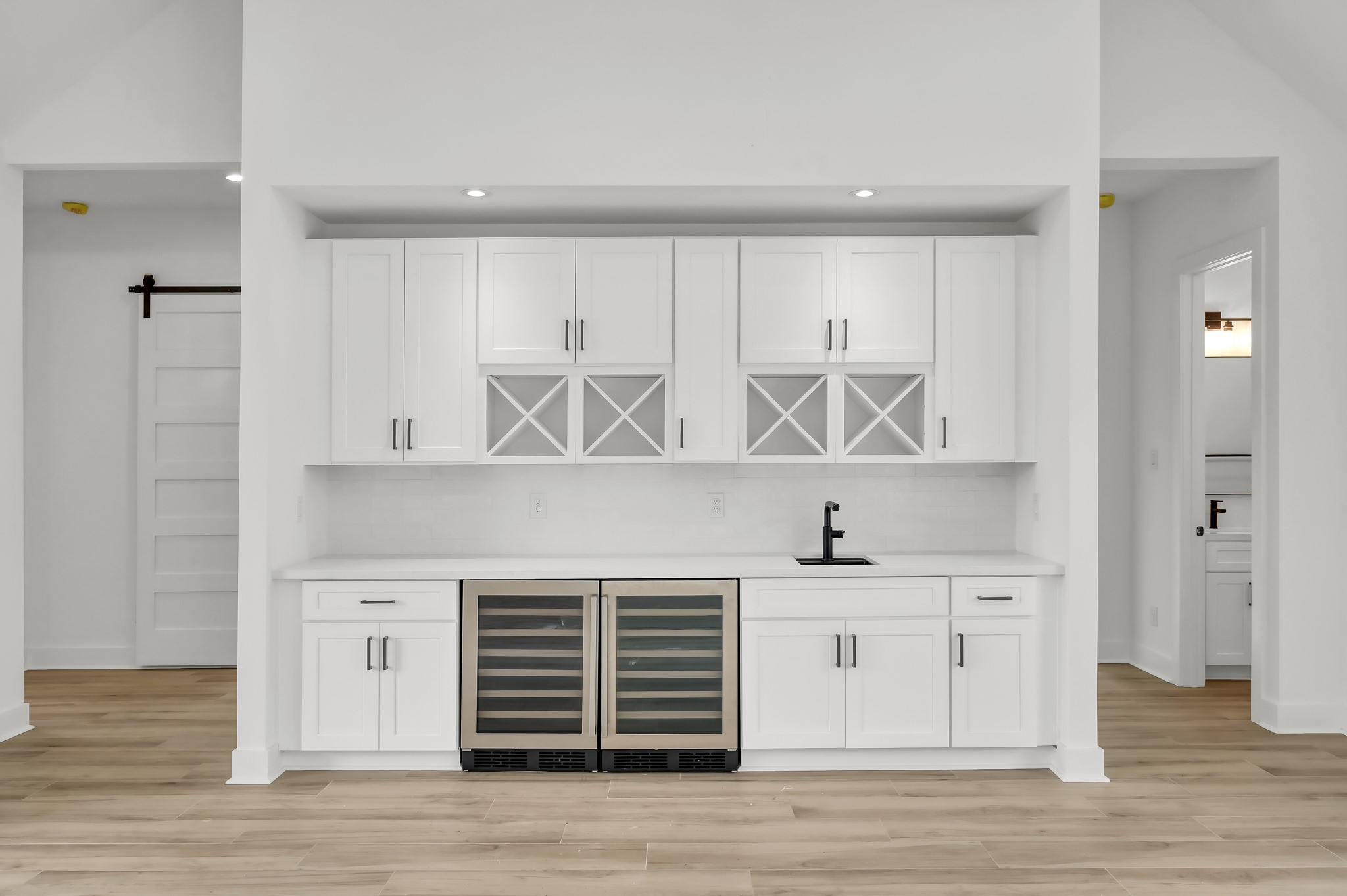 14742 Turquoise Trail Willis, TX 77378 - Photo 8 of 48 a kitchen with a sink cabinets and wooden floor