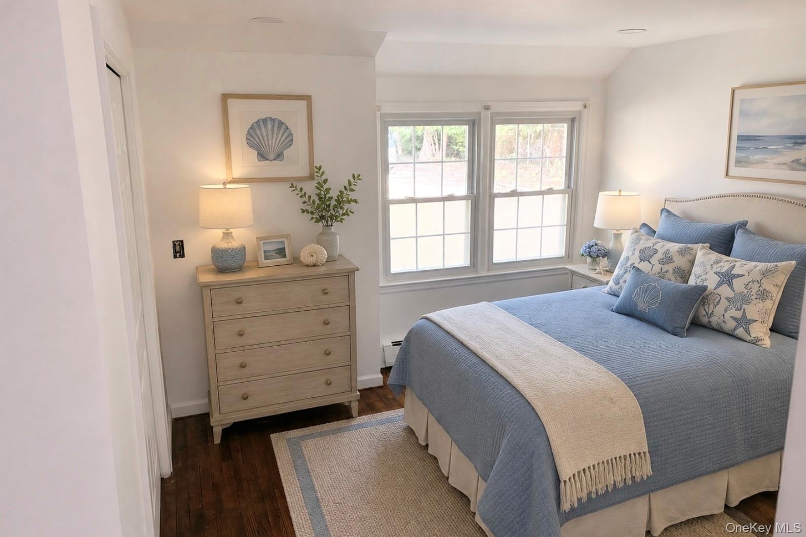 80 Mt Pleasant Road Smithtown, NY 11787 - Photo 6 of 27 a bedroom with a bed and a window