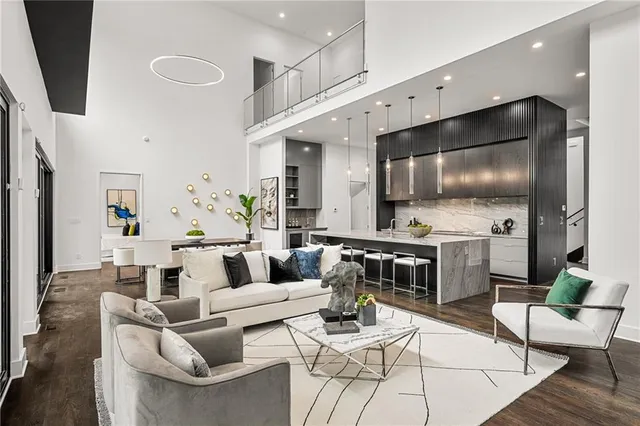 a living room with fireplace furniture and a flat screen tv