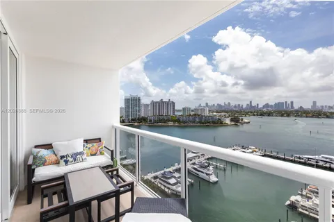 a view of a balcony with an ocean view