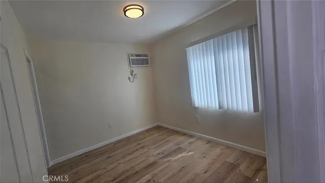 a bathroom with a sink toilet and mirror