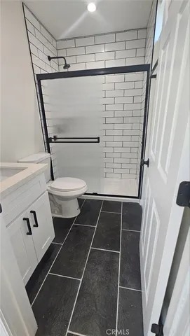 a kitchen with a stove microwave and refrigerator