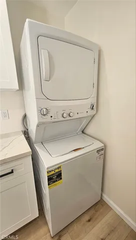 a close view of a stove a microwave and cabinets