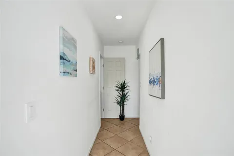 a view of a hallway with entryway