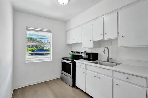 a bathroom with a shower and a toilet