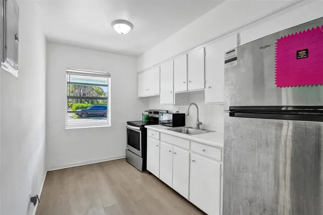 a bathroom with a shower and a toilet