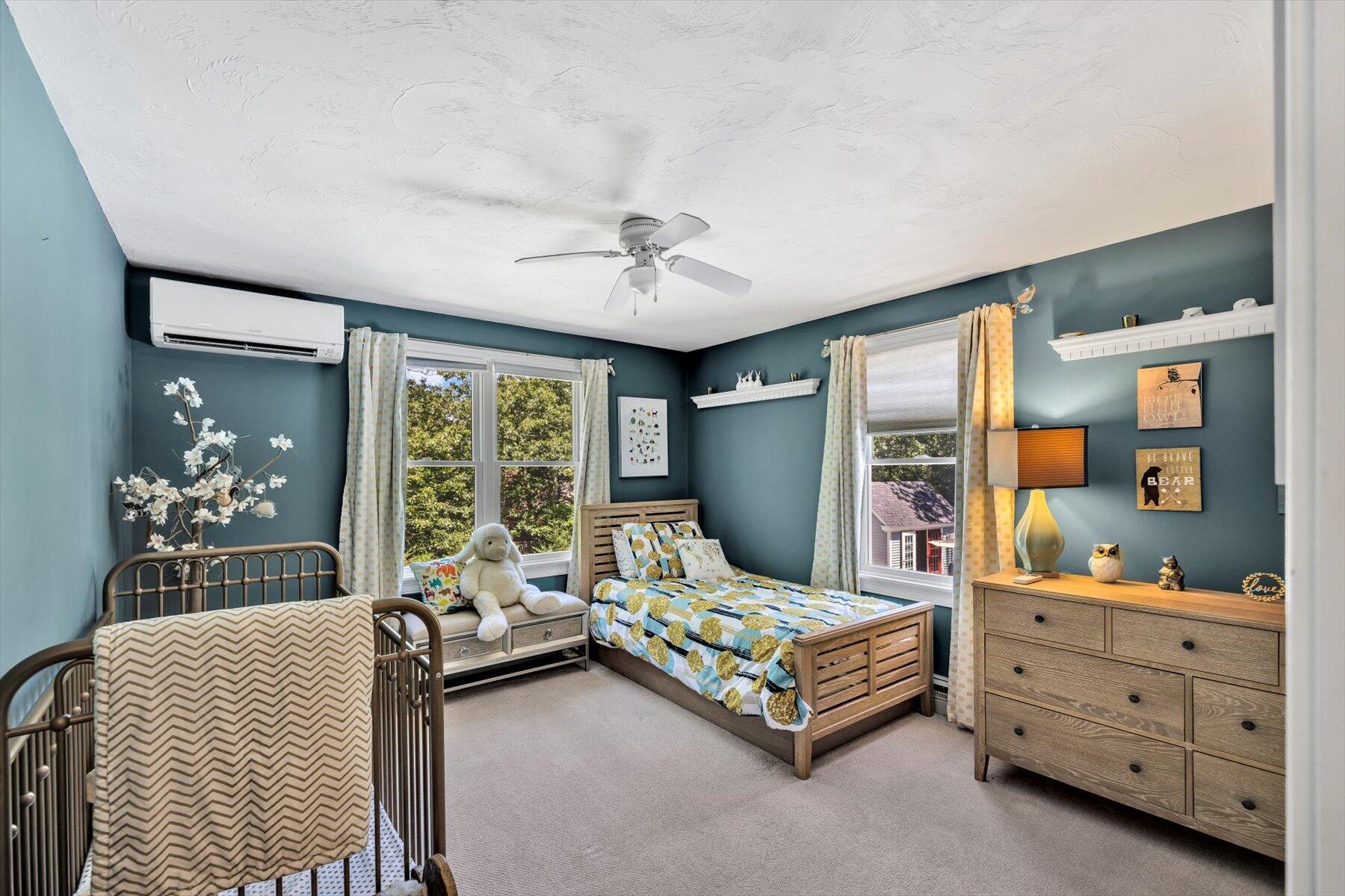 1 Ravens Nest Road Sandwich, MA 02563 - Photo 24 of 46 a bedroom with furniture and large windows