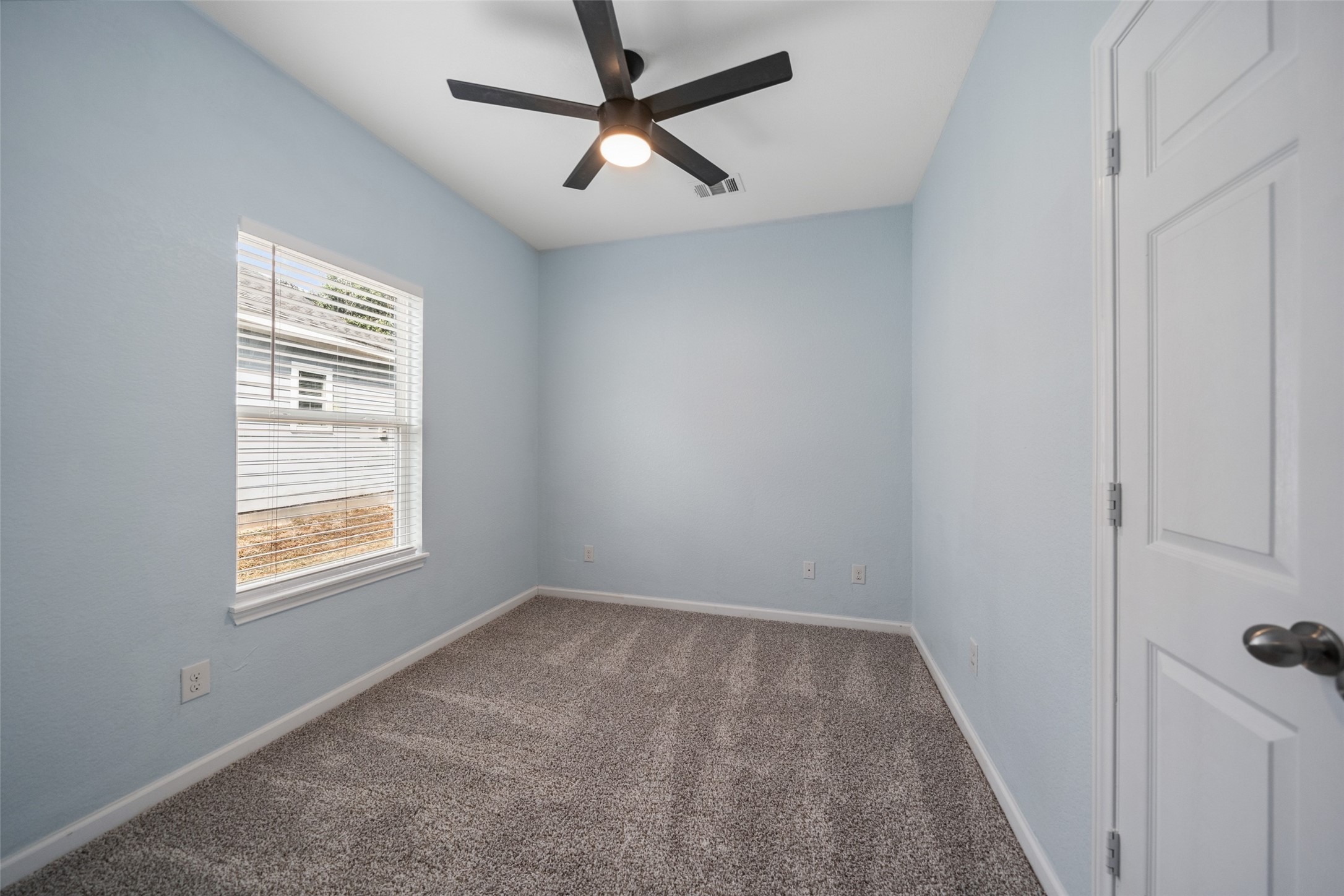 241 Ridgeside Court Montgomery, TX 77316 - Photo 22 of 30 a view of an empty room with a window