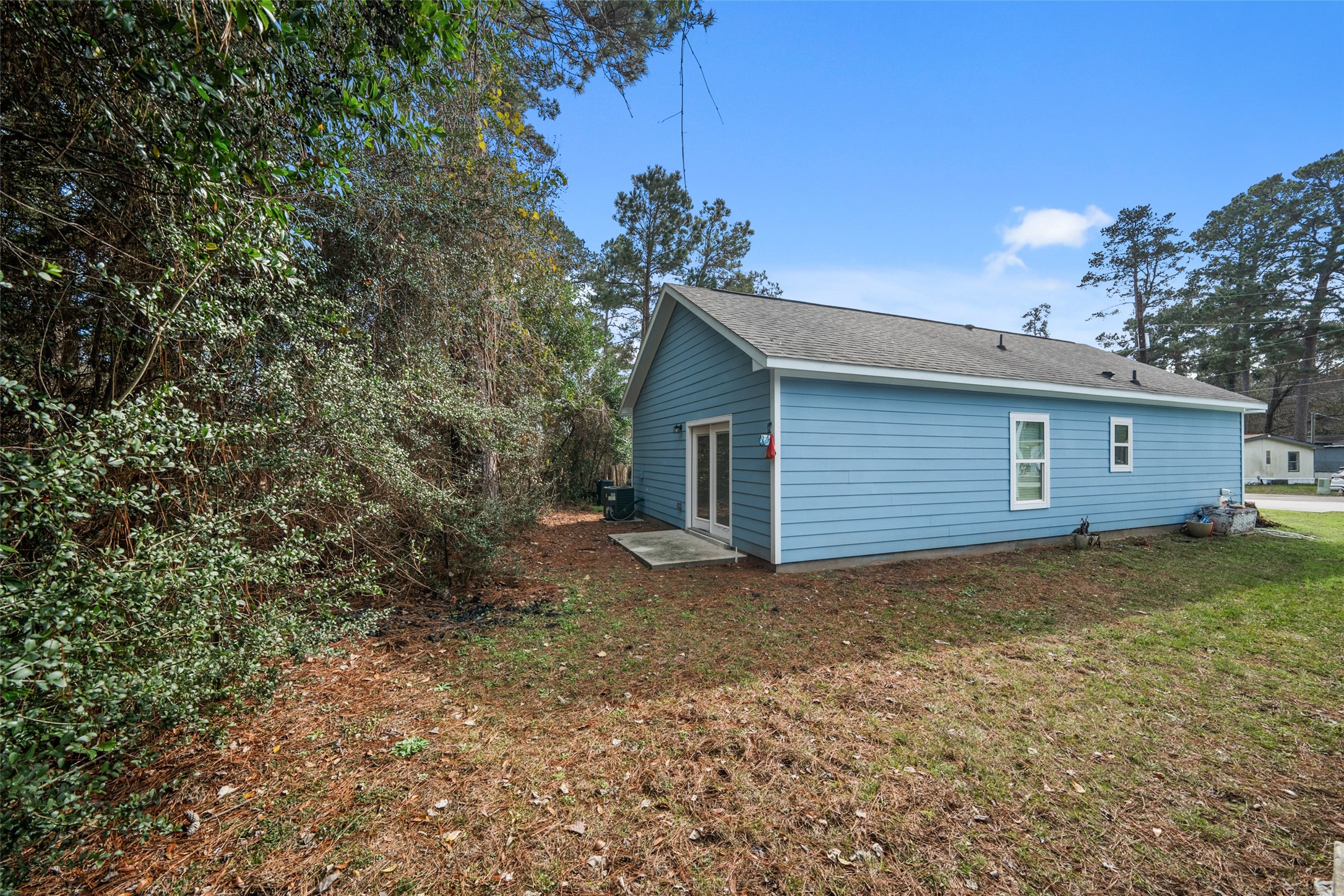 241 Ridgeside Court Montgomery, TX 77316 - Photo 26 of 30 a view of a house with a yard