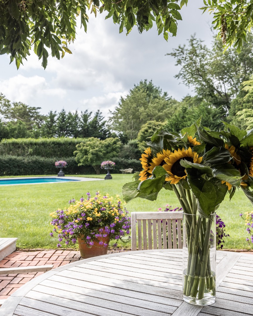 227 Sagaponack Road Bridgehampton, NY 11932 - Photo 12 of 26 a view of a lake with a garden
