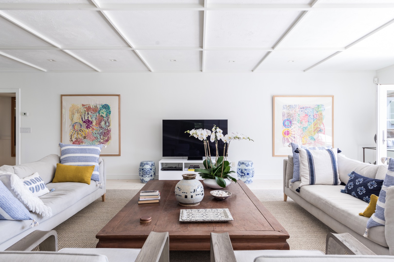 227 Sagaponack Road Bridgehampton, NY 11932 - Photo 14 of 26 a living room with furniture and a flat screen tv