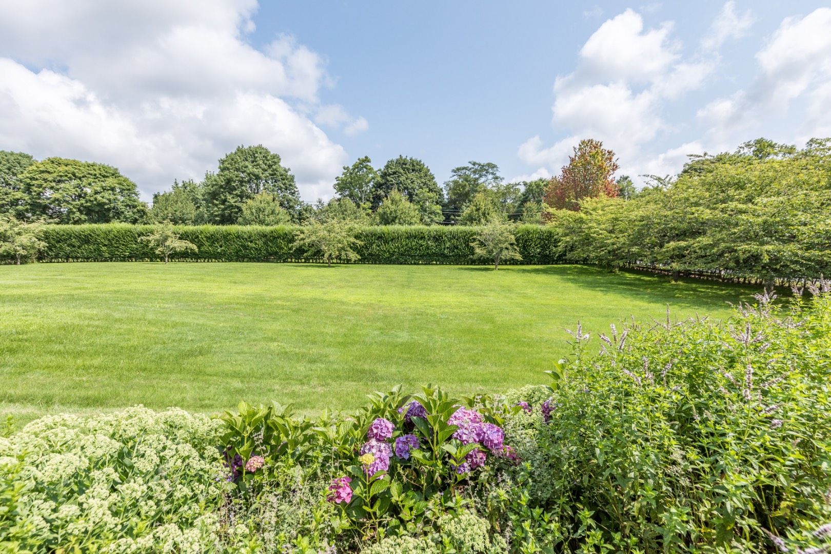 227 Sagaponack Road Bridgehampton, NY 11932 - Photo 9 of 26 a view of an ocean from a building
