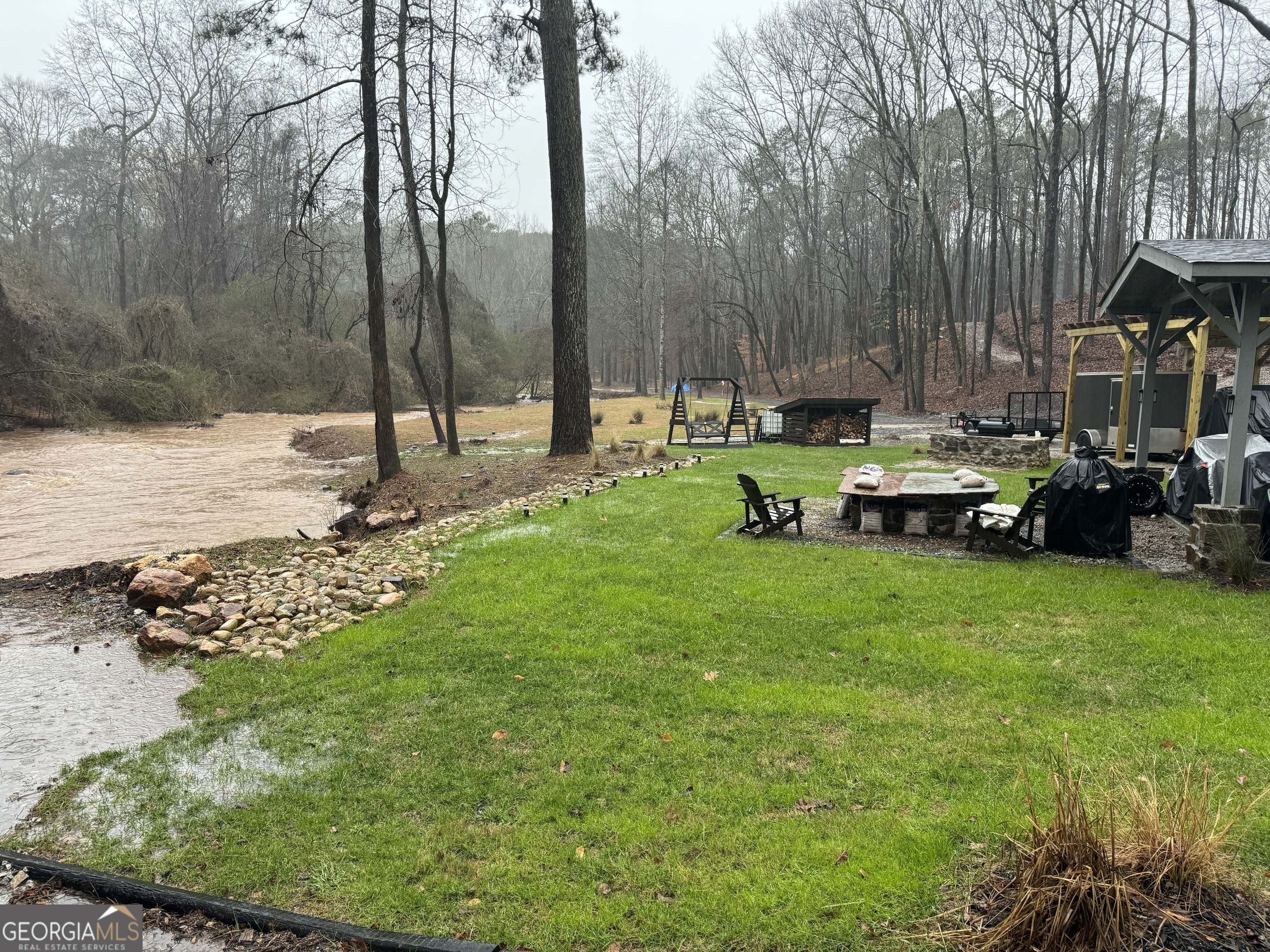1542 Silver Hill Road Stone Mountain, GA 30087 - Photo 12 of 40 a view of a backyard with sitting area