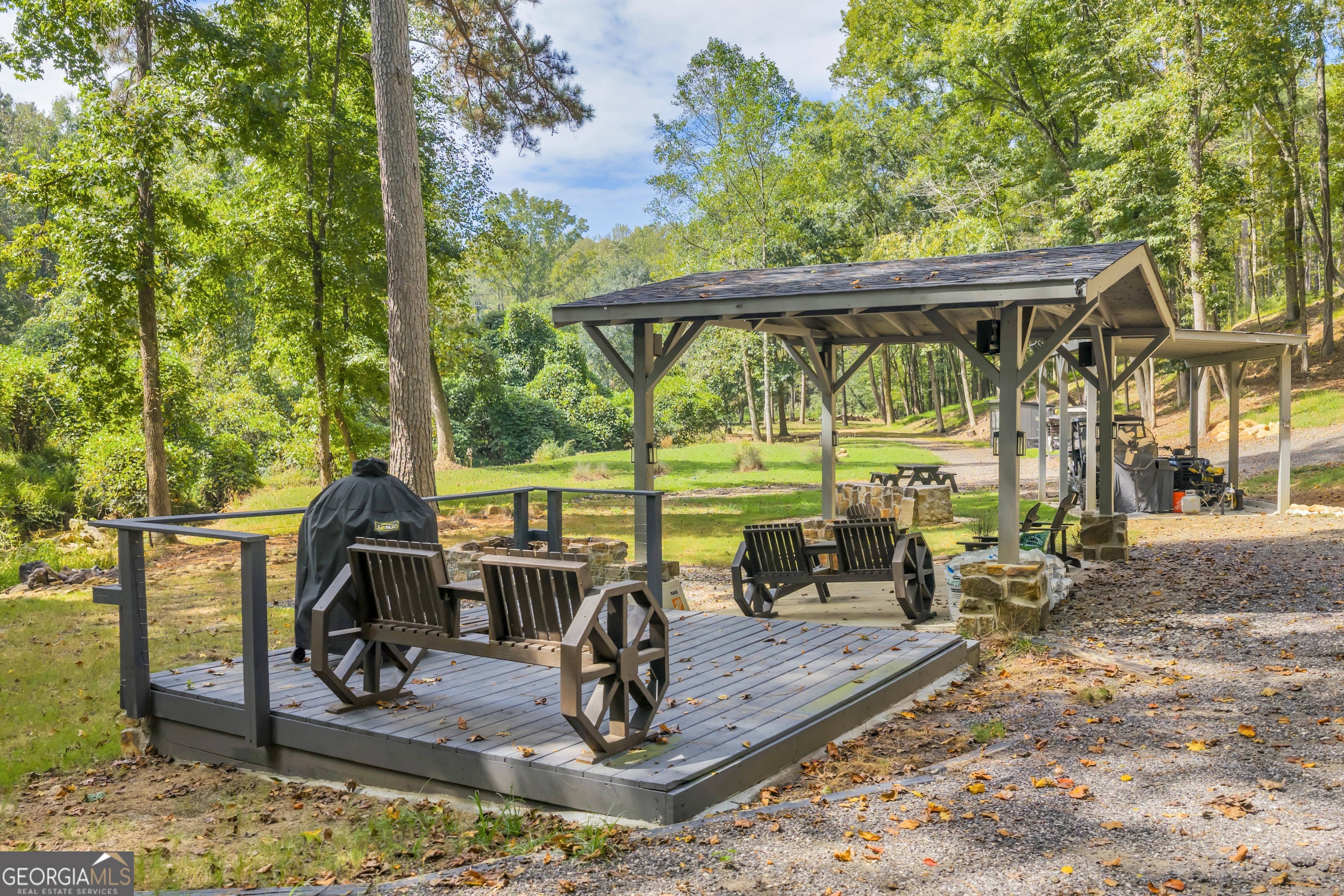 1542 Silver Hill Road Stone Mountain, GA 30087 - Photo 17 of 40 a view of a swimming pool with a patio