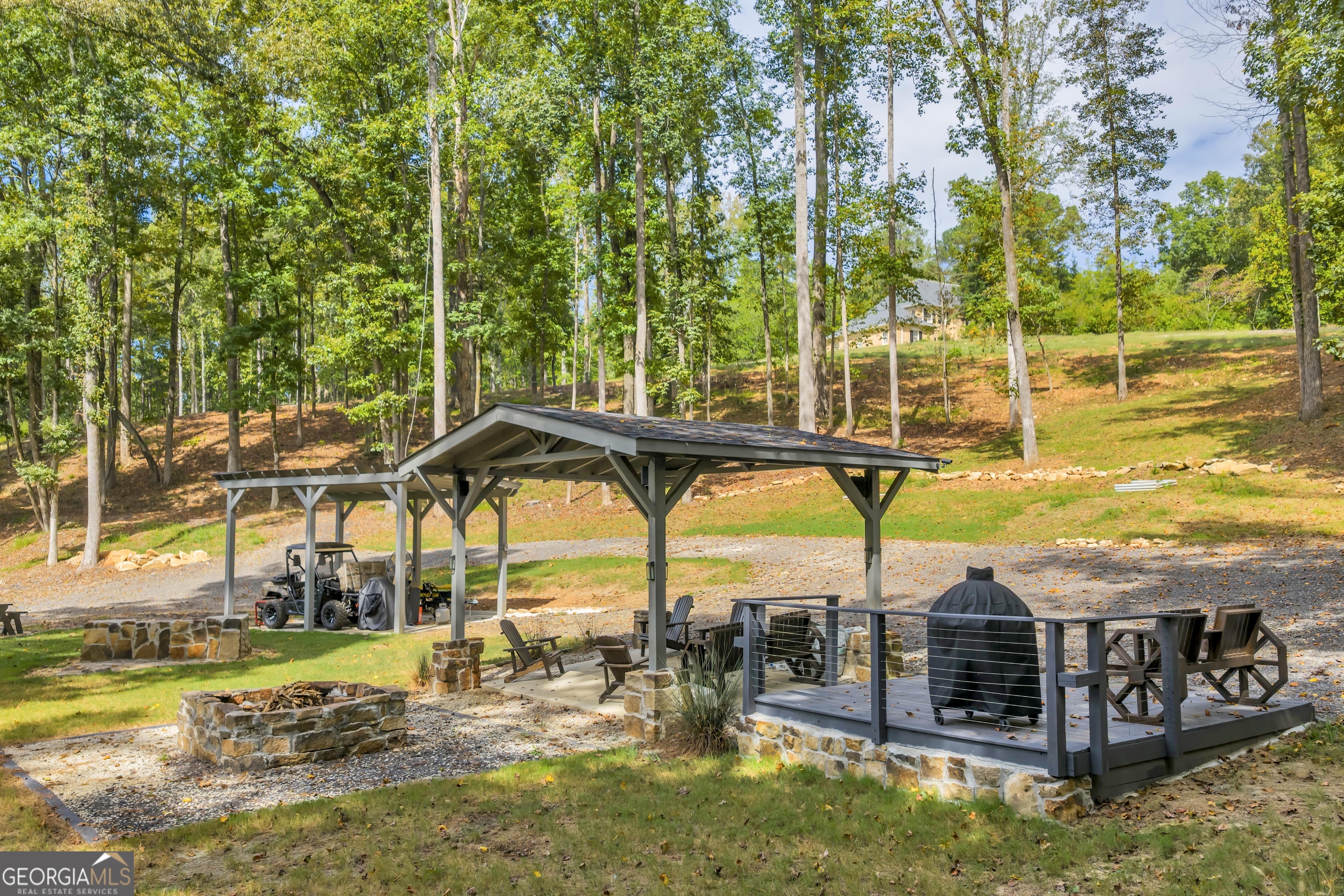1542 Silver Hill Road Stone Mountain, GA 30087 - Photo 19 of 40 a view of a swimming pool with a patio