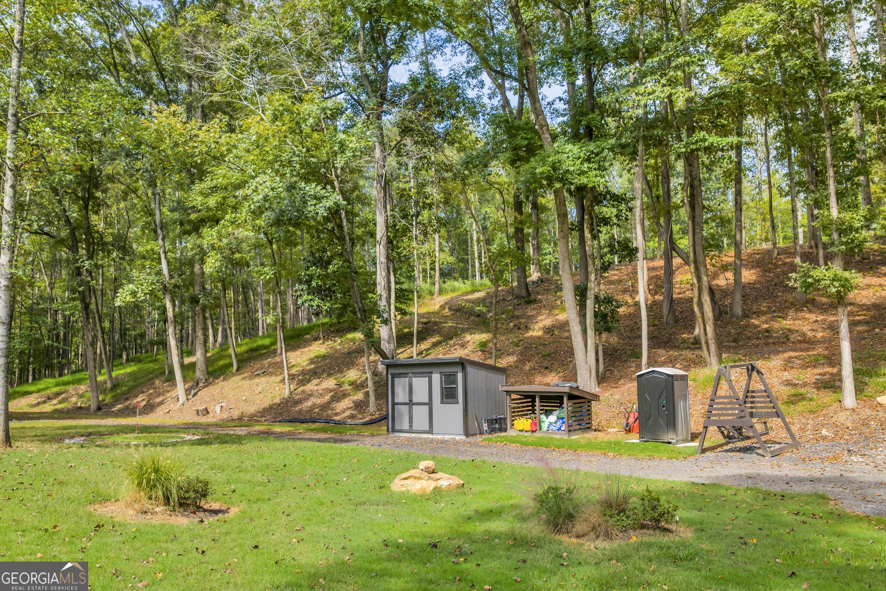 1542 Silver Hill Road Stone Mountain, GA 30087 - Photo 20 of 40 front view of a house with a yard