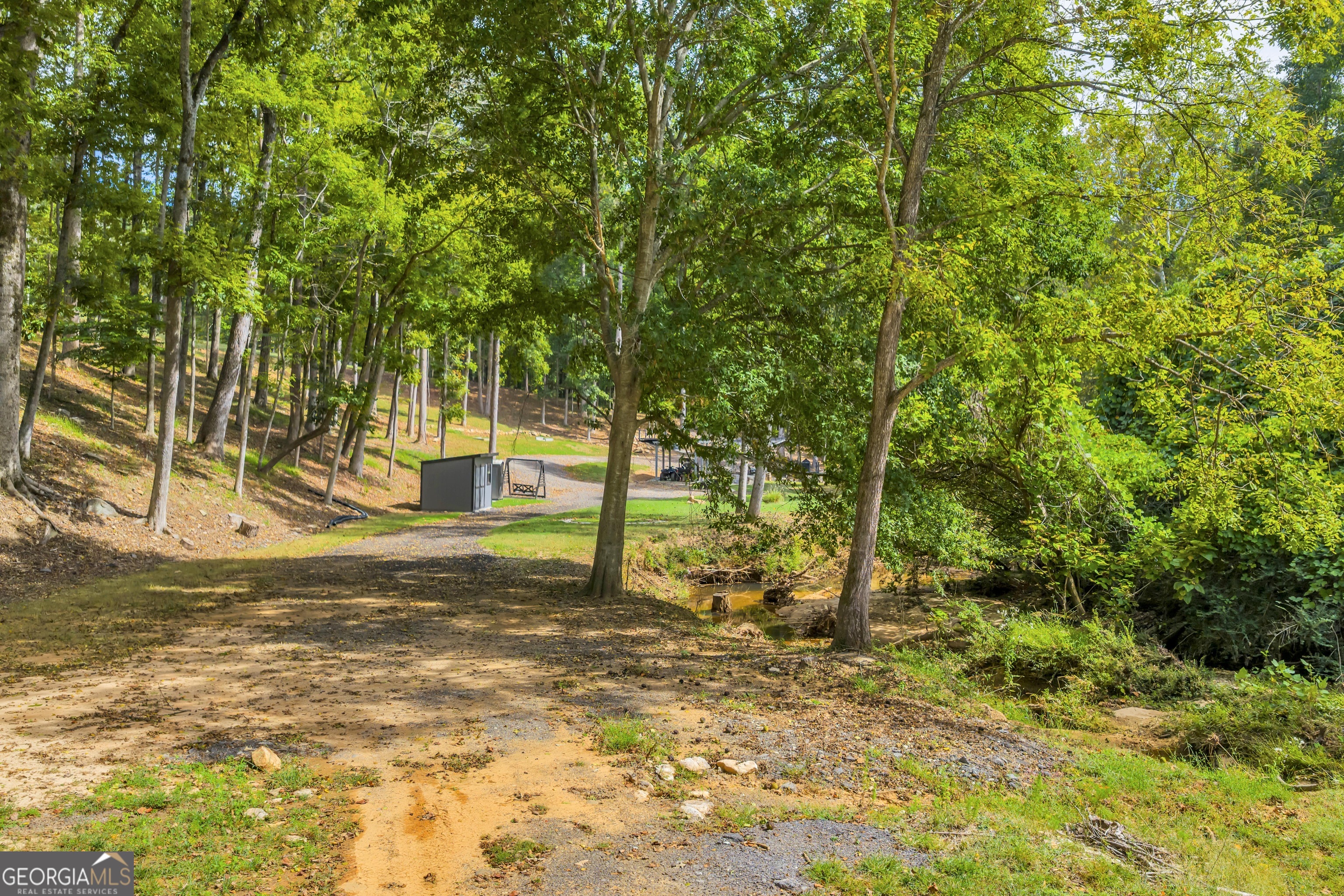 1542 Silver Hill Road Stone Mountain, GA 30087 - Photo 21 of 40 a view of a yard with trees
