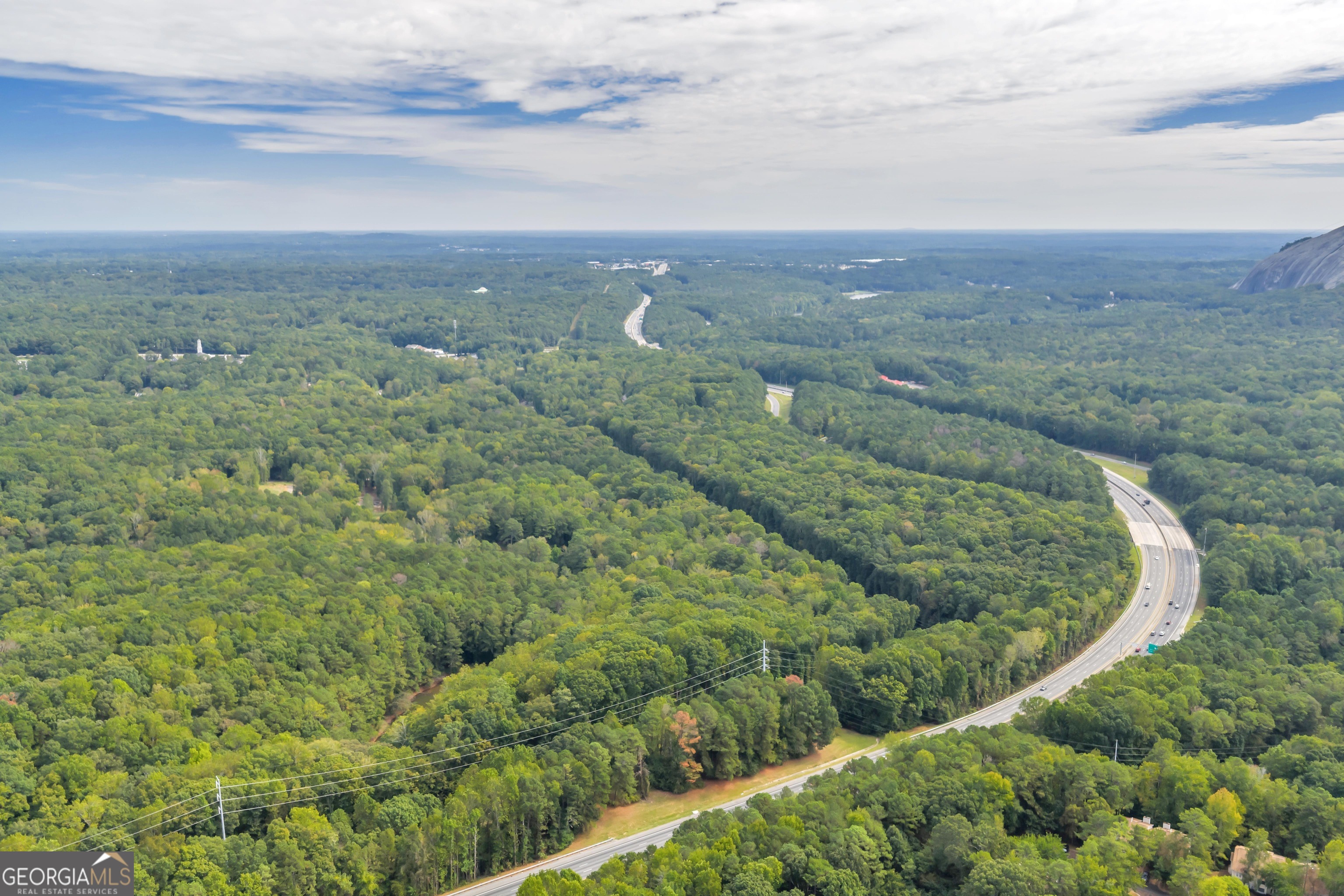 1542 Silver Hill Road Stone Mountain, GA 30087 - Photo 36 of 40 a view of a field with an ocean