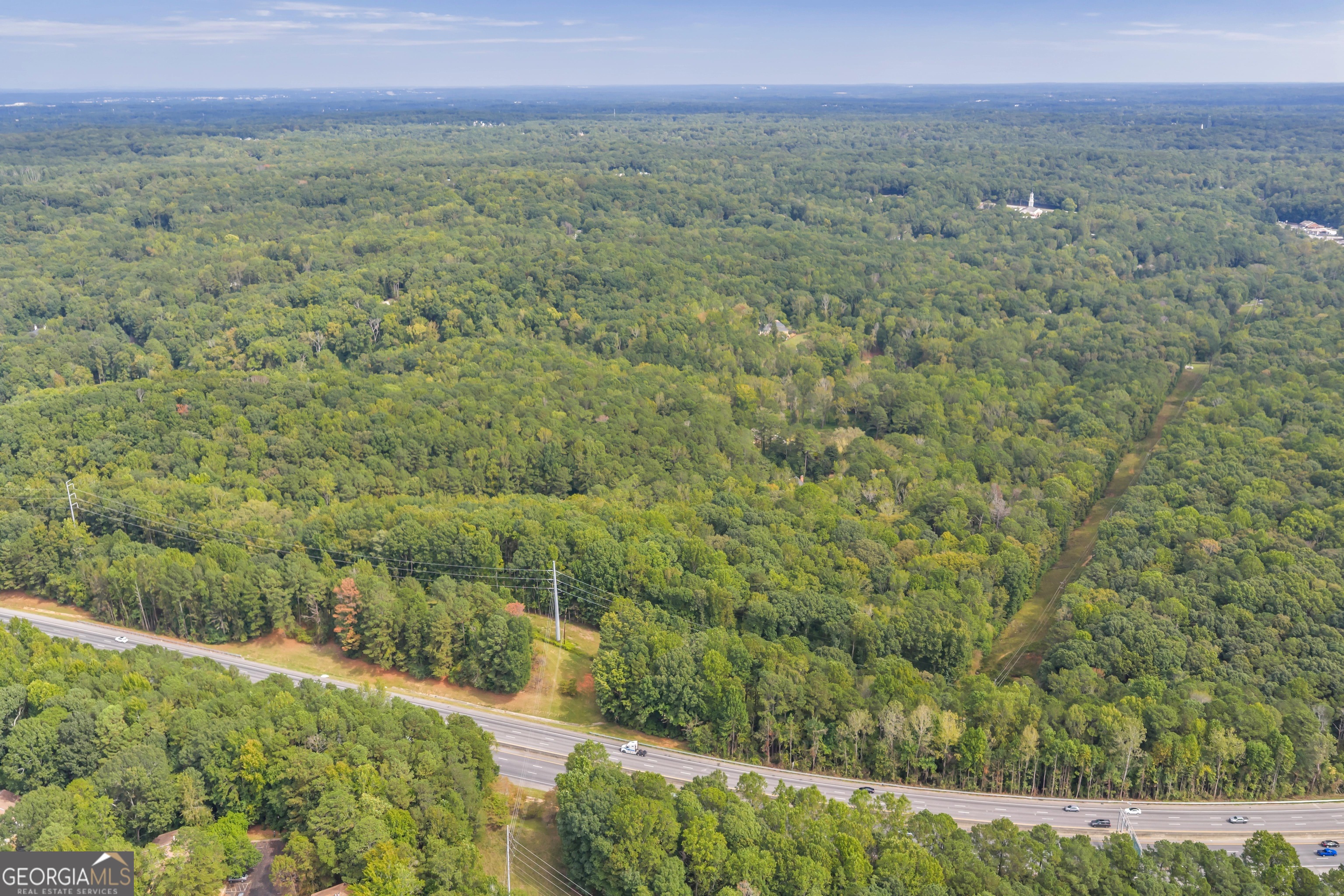1542 Silver Hill Road Stone Mountain, GA 30087 - Photo 37 of 40 a view of a lush green field