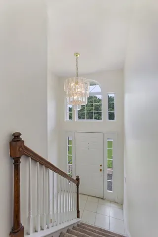 a view of a hallway with windows