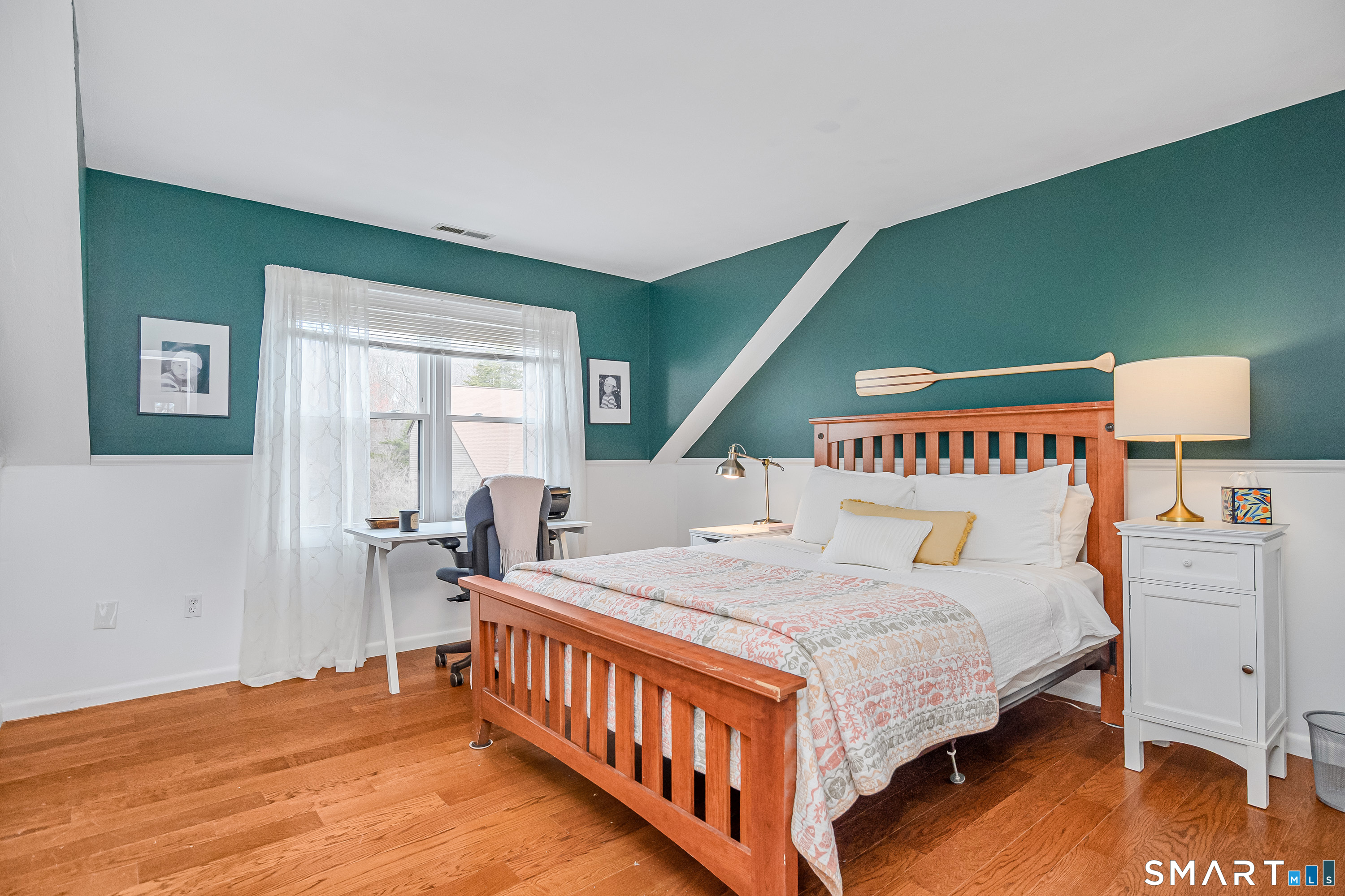 6 Echowoods Circle, Unit 6 Monroe, CT 06468 - Photo 18 of 25 a bedroom with a bed and a table in it