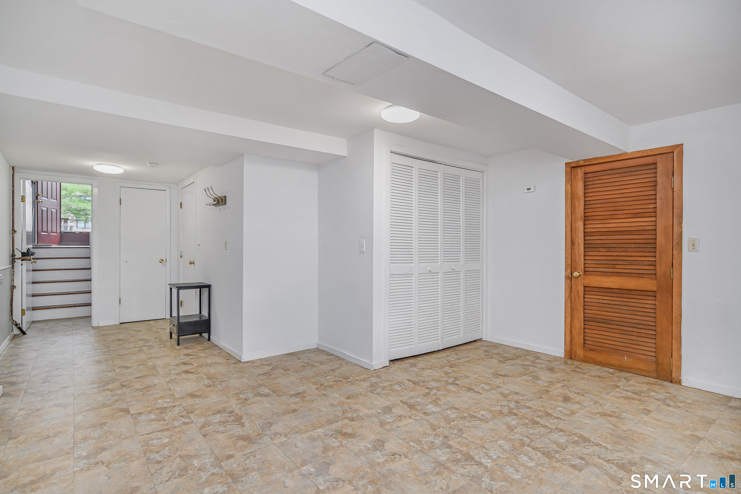 6 Echowoods Circle, Unit 6 Monroe, CT 06468 - Photo 20 of 25 a view of an empty room with closet and bathroom