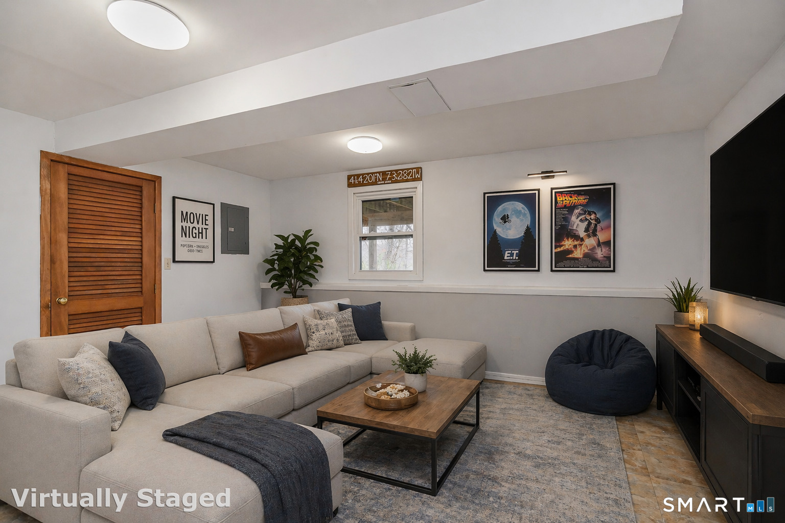 6 Echowoods Circle, Unit 6 Monroe, CT 06468 - Photo 22 of 25 a living room with furniture a couch and a flat screen tv