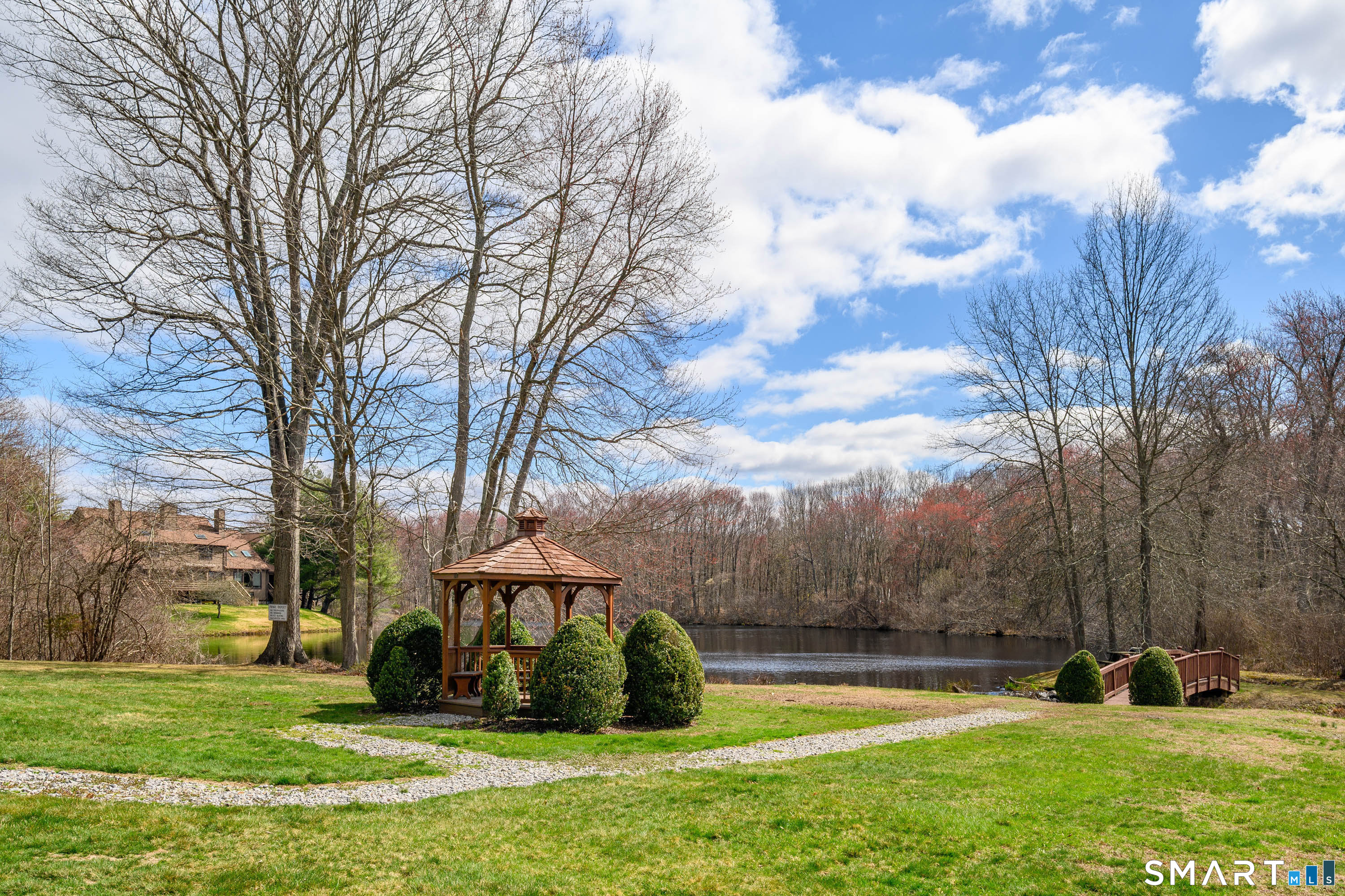 6 Echowoods Circle, Unit 6 Monroe, CT 06468 - Photo 25 of 25 a view of a garden with trees
