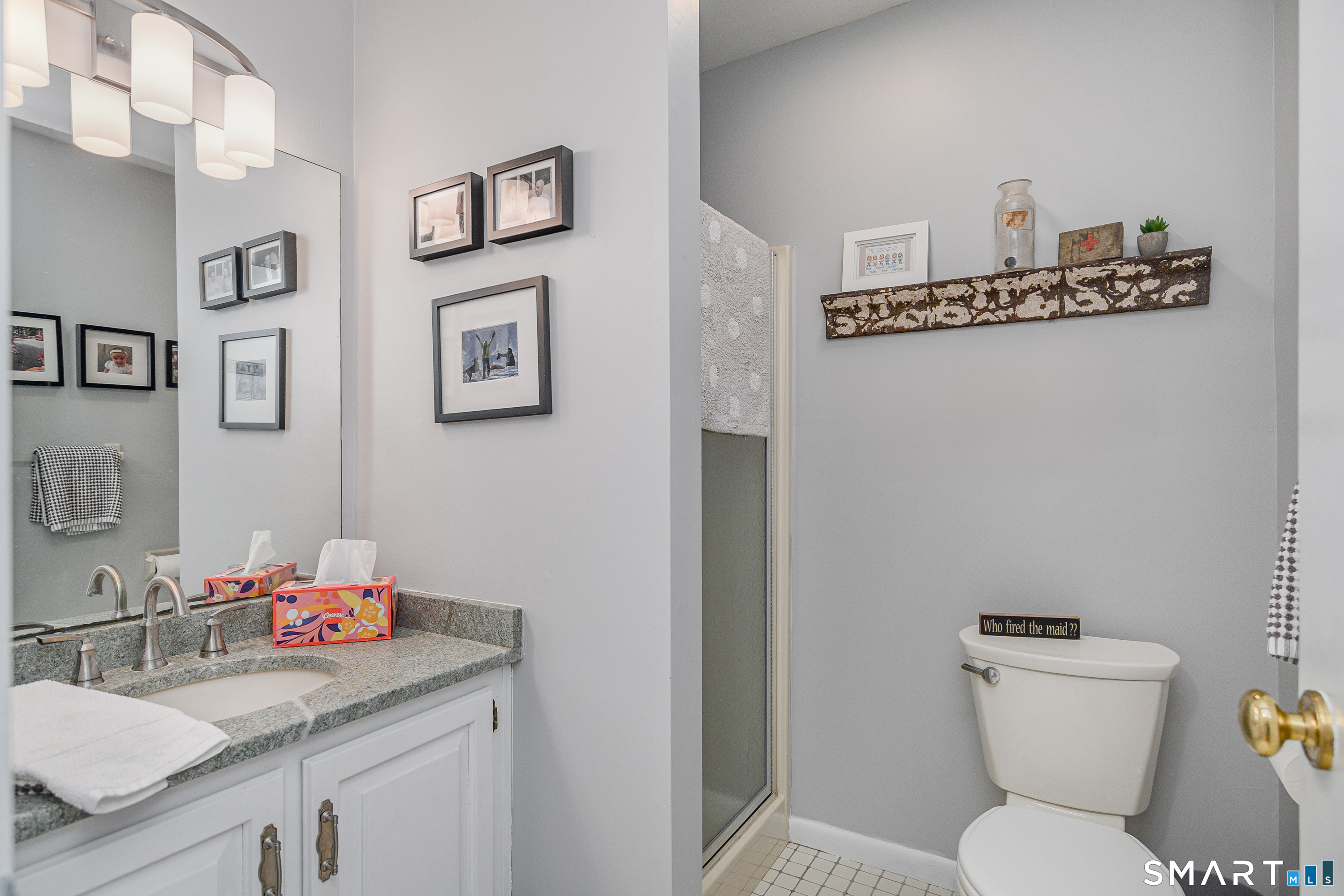 6 Echowoods Circle, Unit 6 Monroe, CT 06468 - Photo 5 of 25 a bathroom with a toilet sink and mirror