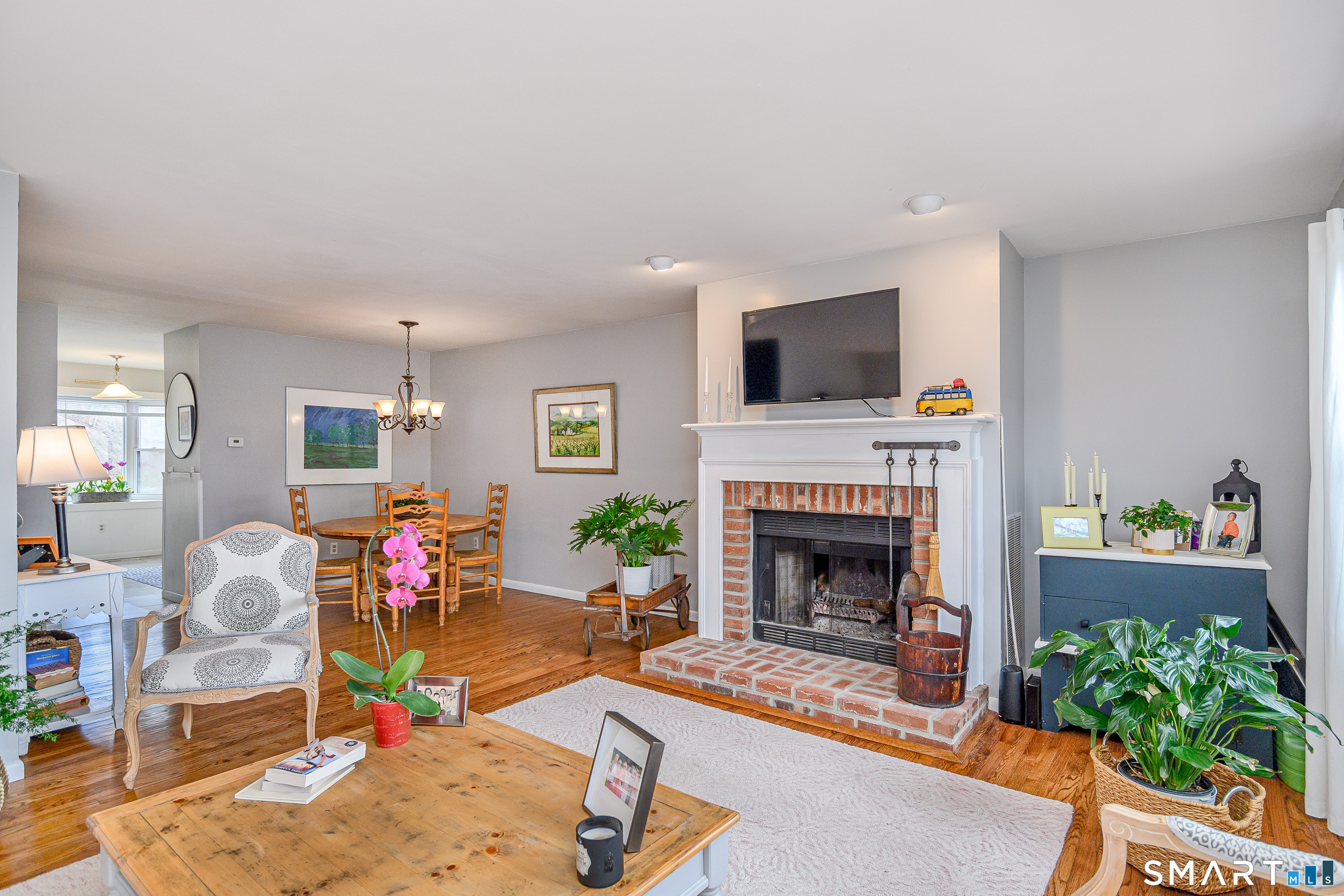6 Echowoods Circle, Unit 6 Monroe, CT 06468 - Photo 9 of 25 a living room with furniture and a fireplace