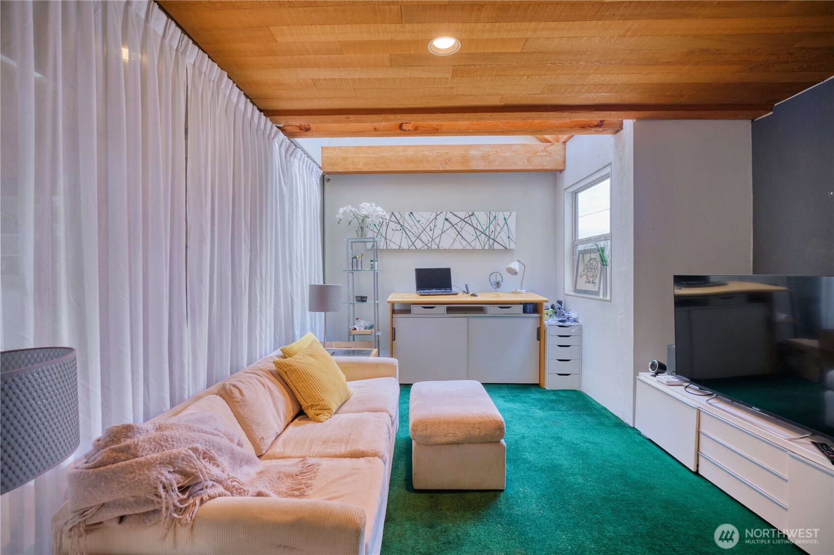731 Kendor Drive Point Roberts, WA 98281 - Photo 23 of 40 a living room with furniture and a flat screen tv