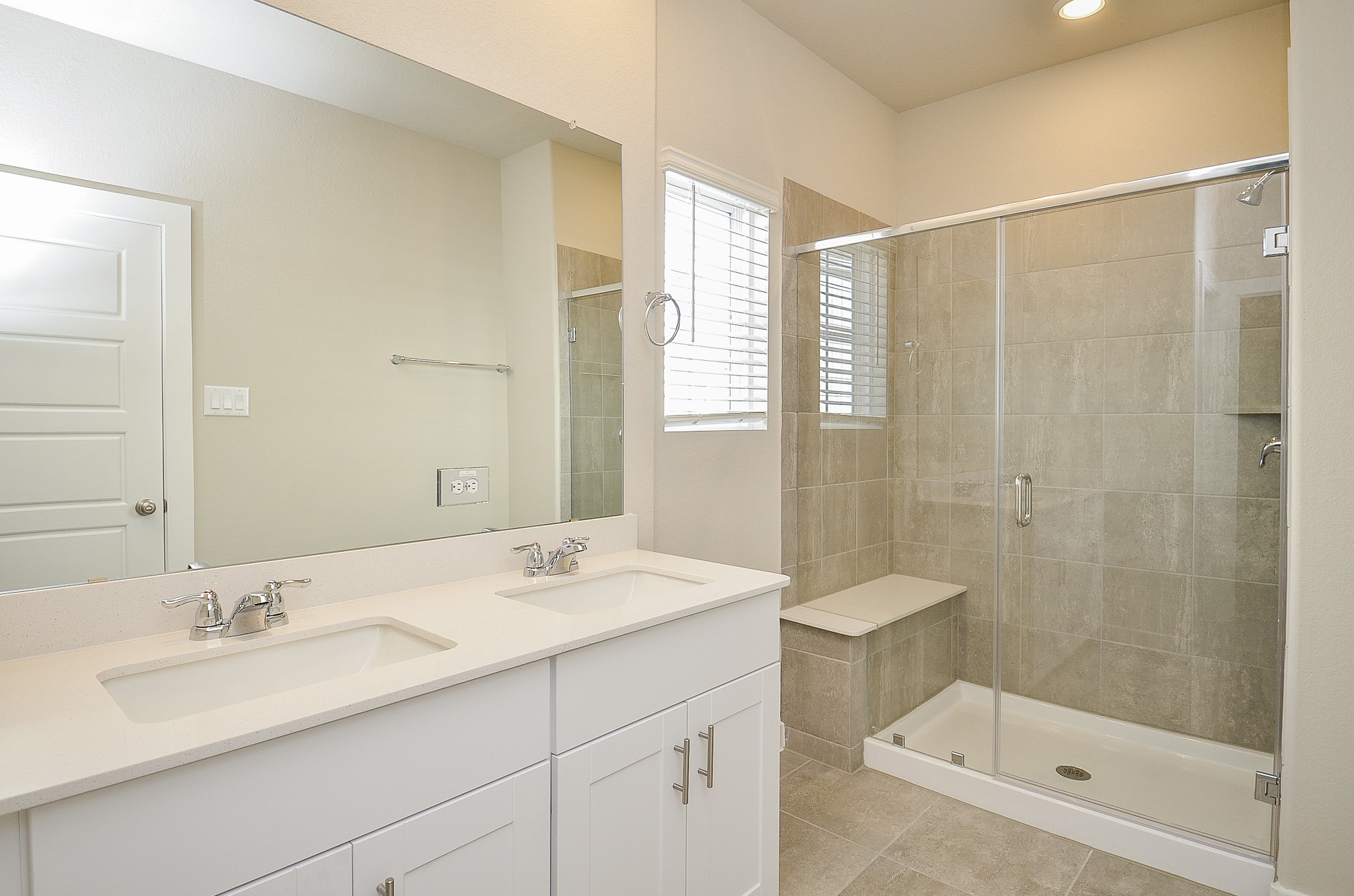 3107 Boulder Rnch Drive Houston, TX 77063 - Photo 24 of 40 a bathroom with a sink double vanity and shower