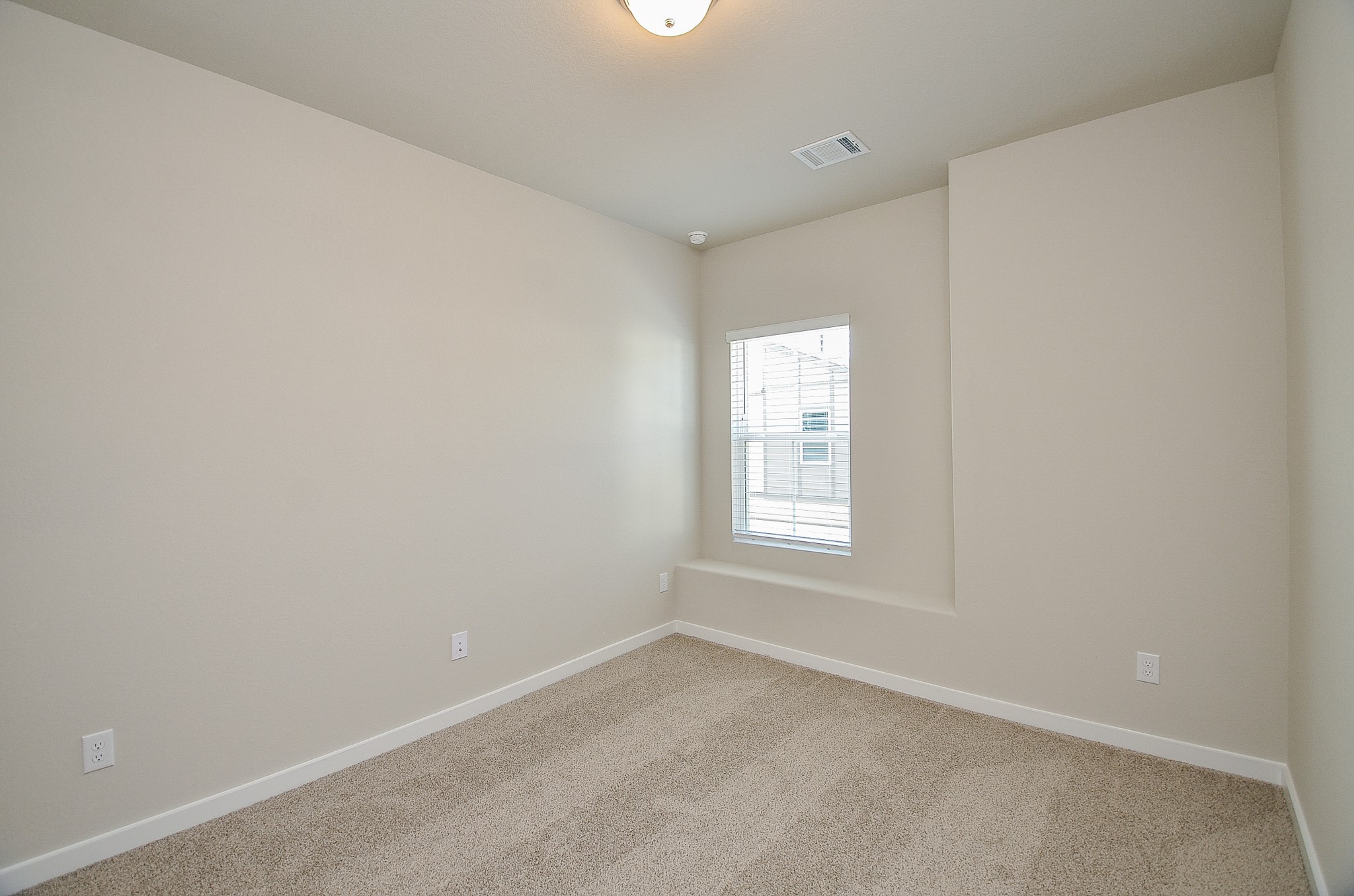 3107 Boulder Rnch Drive Houston, TX 77063 - Photo 31 of 40 an empty room with a window