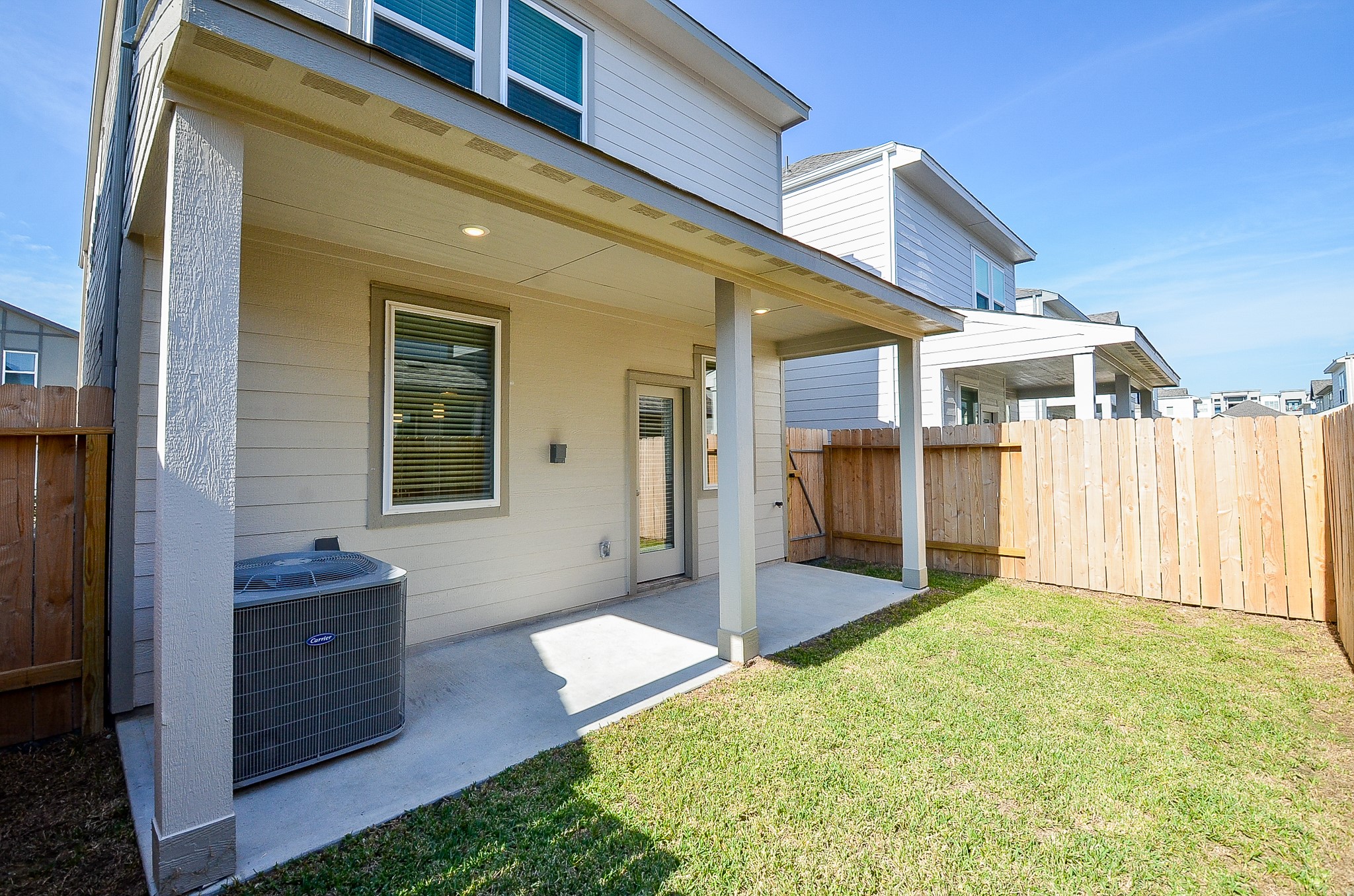 3107 Boulder Rnch Drive Houston, TX 77063 - Photo 7 of 40 a view of a porch with wooden floor and a yard