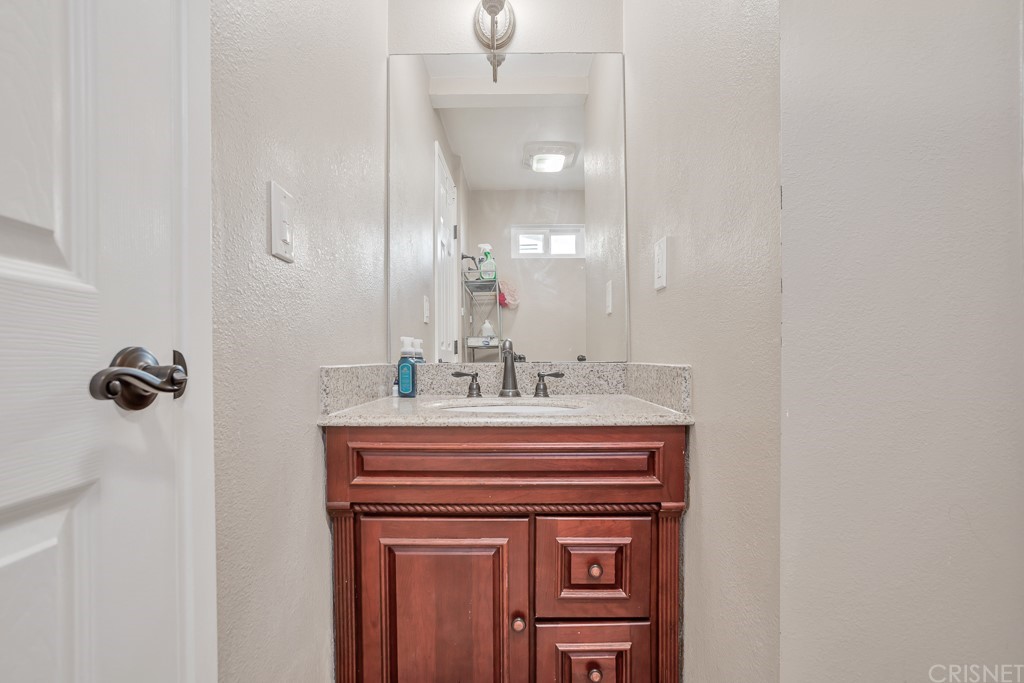 20610 Gresham Street Winnetka, CA 91306 - Photo 19 of 33 a view of a bathroom from a sink