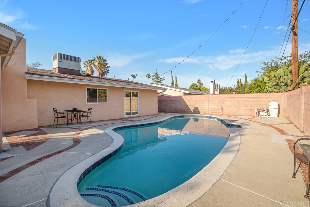 20610 Gresham Street Winnetka, CA 91306 - Photo 22 of 33 a view of a patio with swimming pool