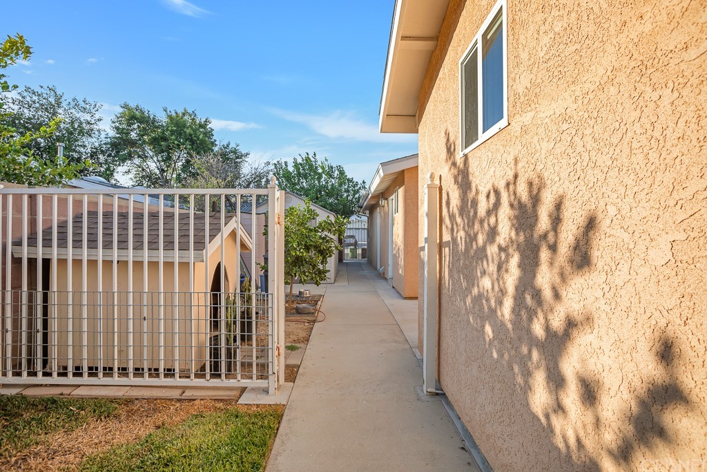 20610 Gresham Street Winnetka, CA 91306 - Photo 26 of 33 a view of a house with a street