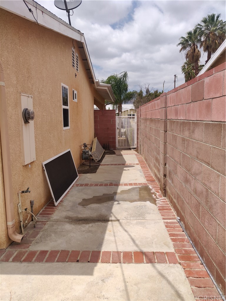 20610 Gresham Street Winnetka, CA 91306 - Photo 28 of 33 a backyard of a house