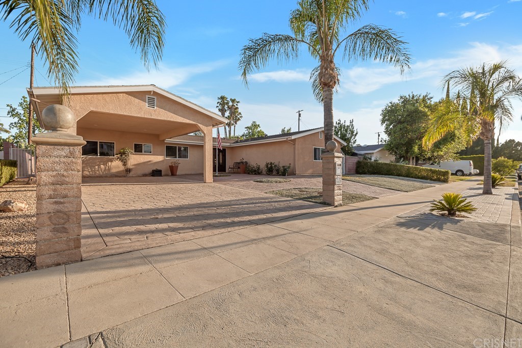 20610 Gresham Street Winnetka, CA 91306 - Photo 29 of 33 a view of a street with palm trees