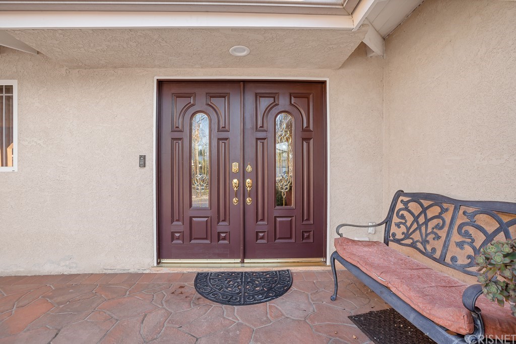 20610 Gresham Street Winnetka, CA 91306 - Photo 3 of 33 a view of front door with a couch