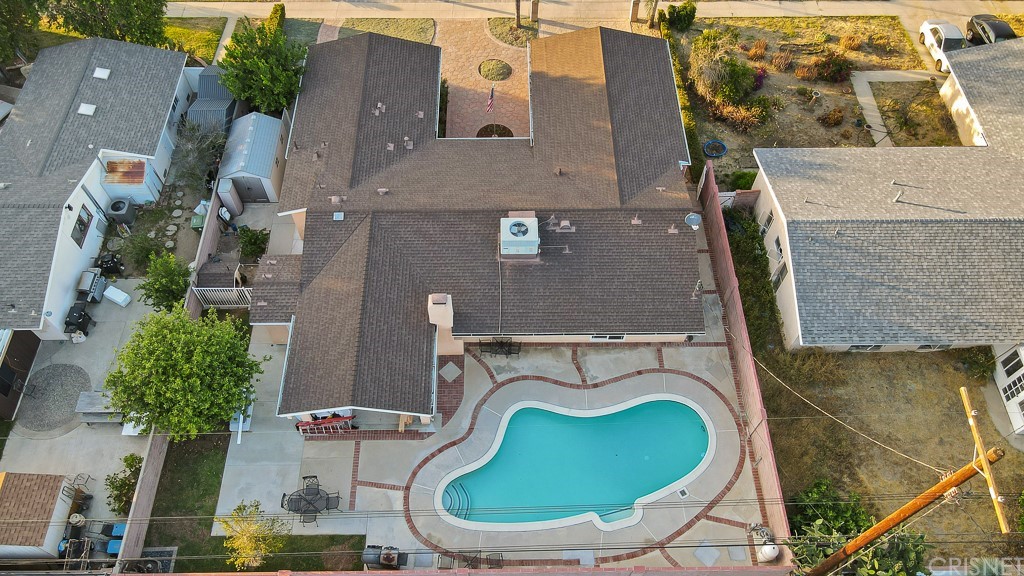 20610 Gresham Street Winnetka, CA 91306 - Photo 33 of 33 an aerial view of a house with swimming pool