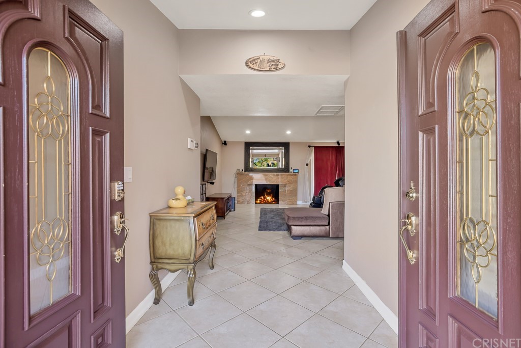 20610 Gresham Street Winnetka, CA 91306 - Photo 4 of 33 a living room with furniture