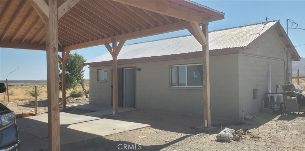 7634 Cinnabar Road Mojave, CA 93501 - Photo 3 of 8 a outdoor space view with a backyard space